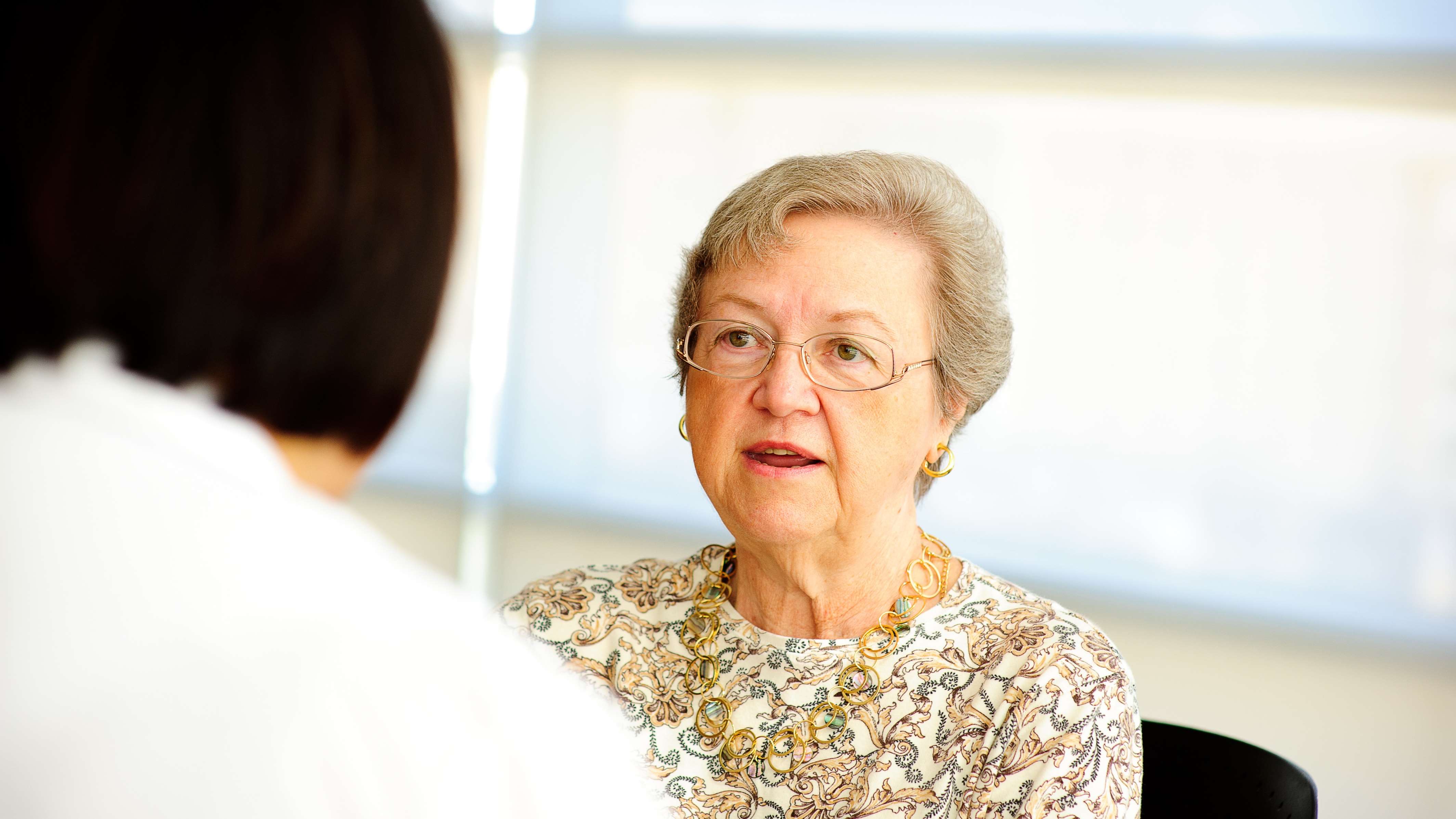 Dr. Tsai with Patient.