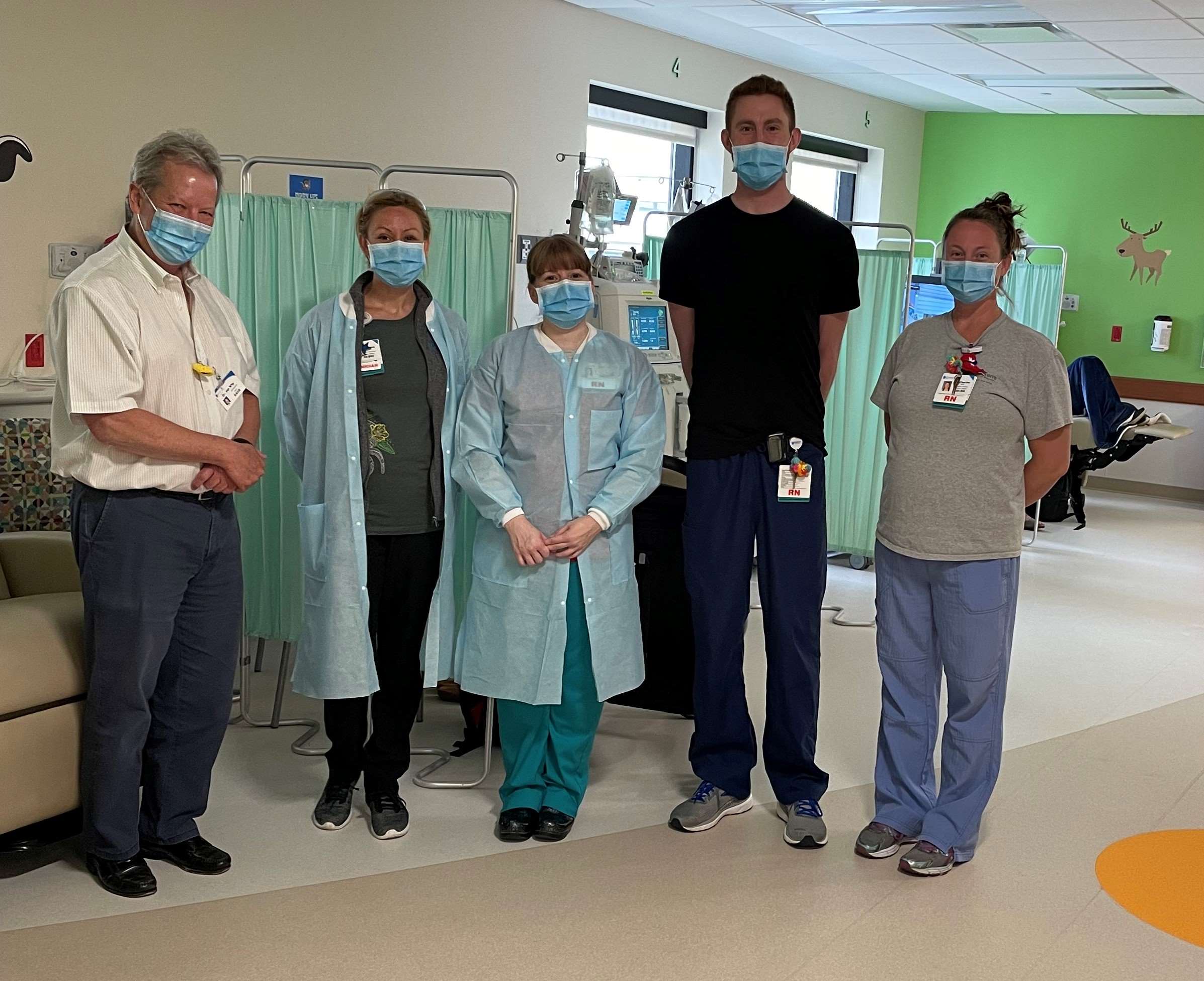 medical professionals in patient area