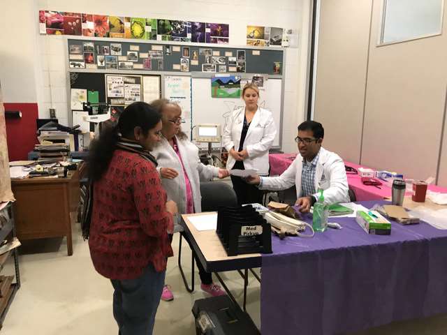 MCW School of Pharmacy students volunteering at Bread of Healing Clinic