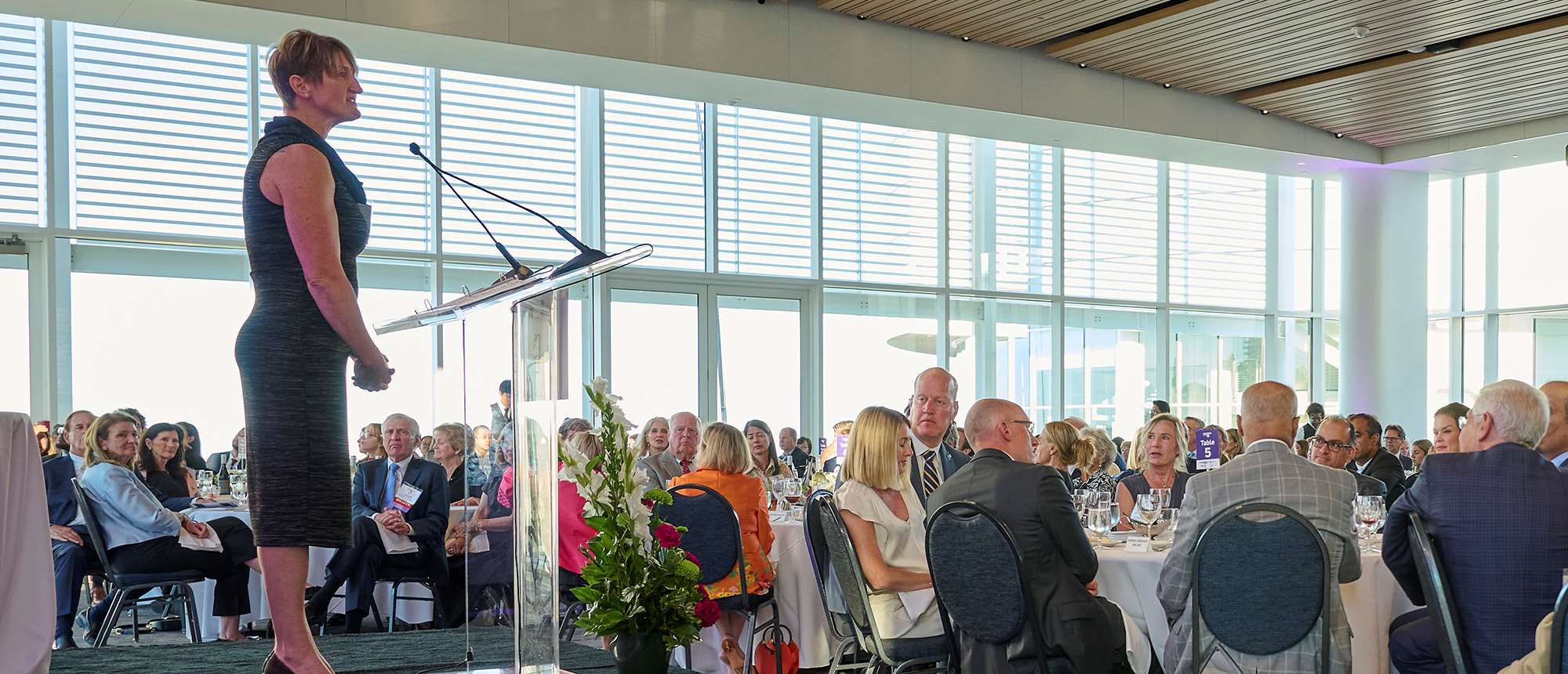 A woman speaking at an event