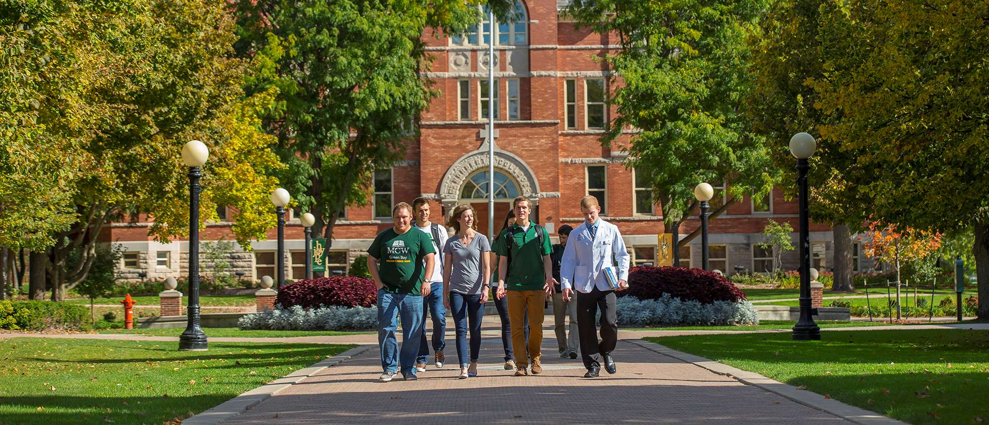 Students walking in front of building