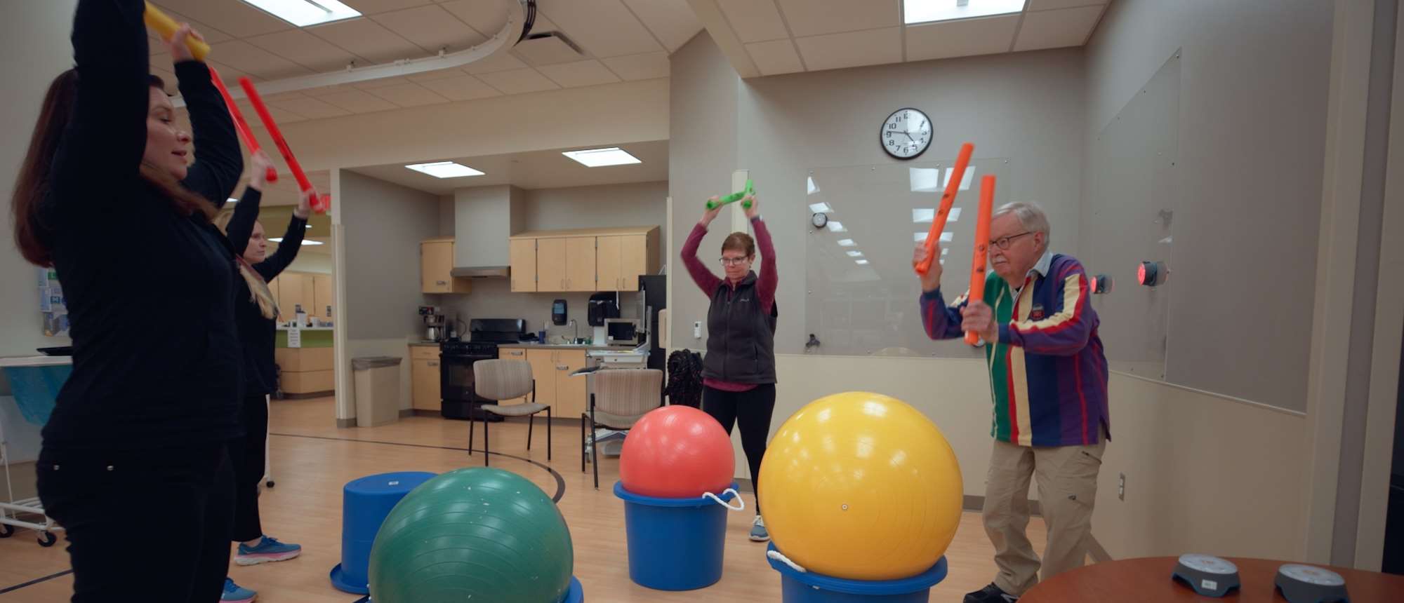 Four people exercising