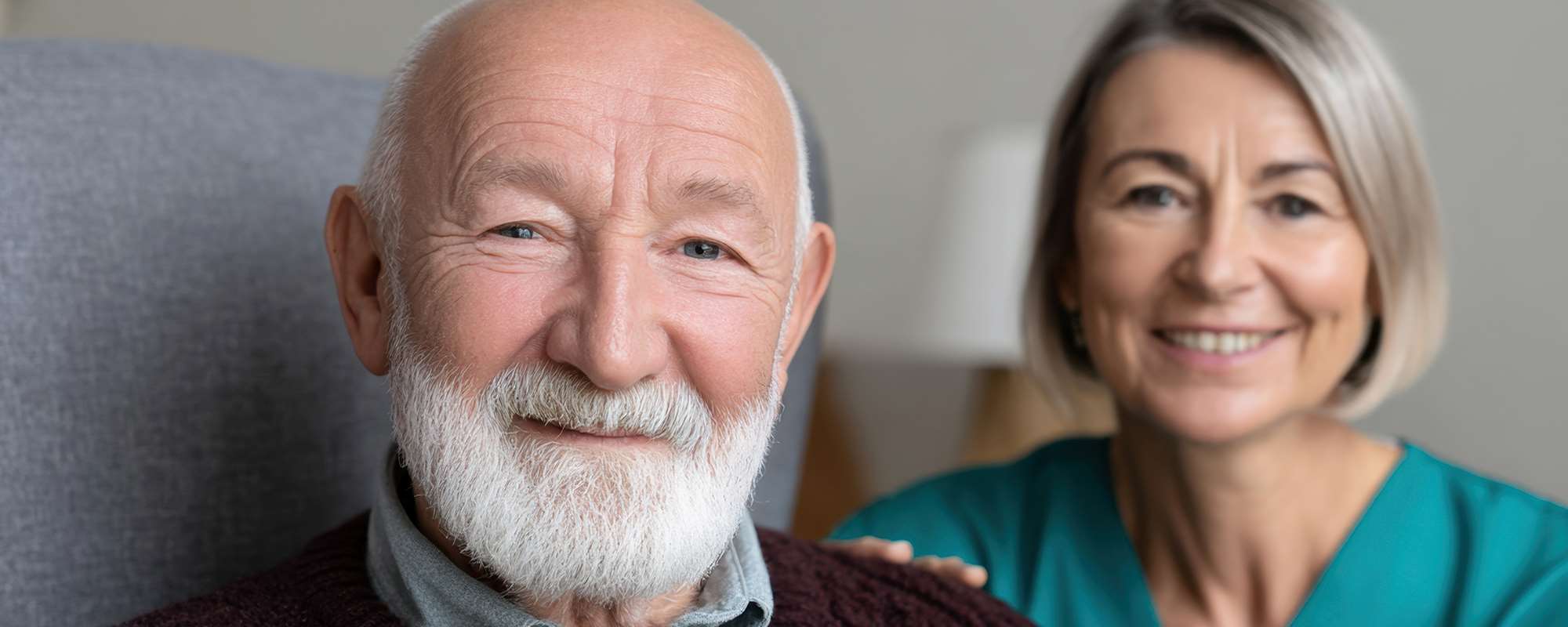 Older man and woman standing together