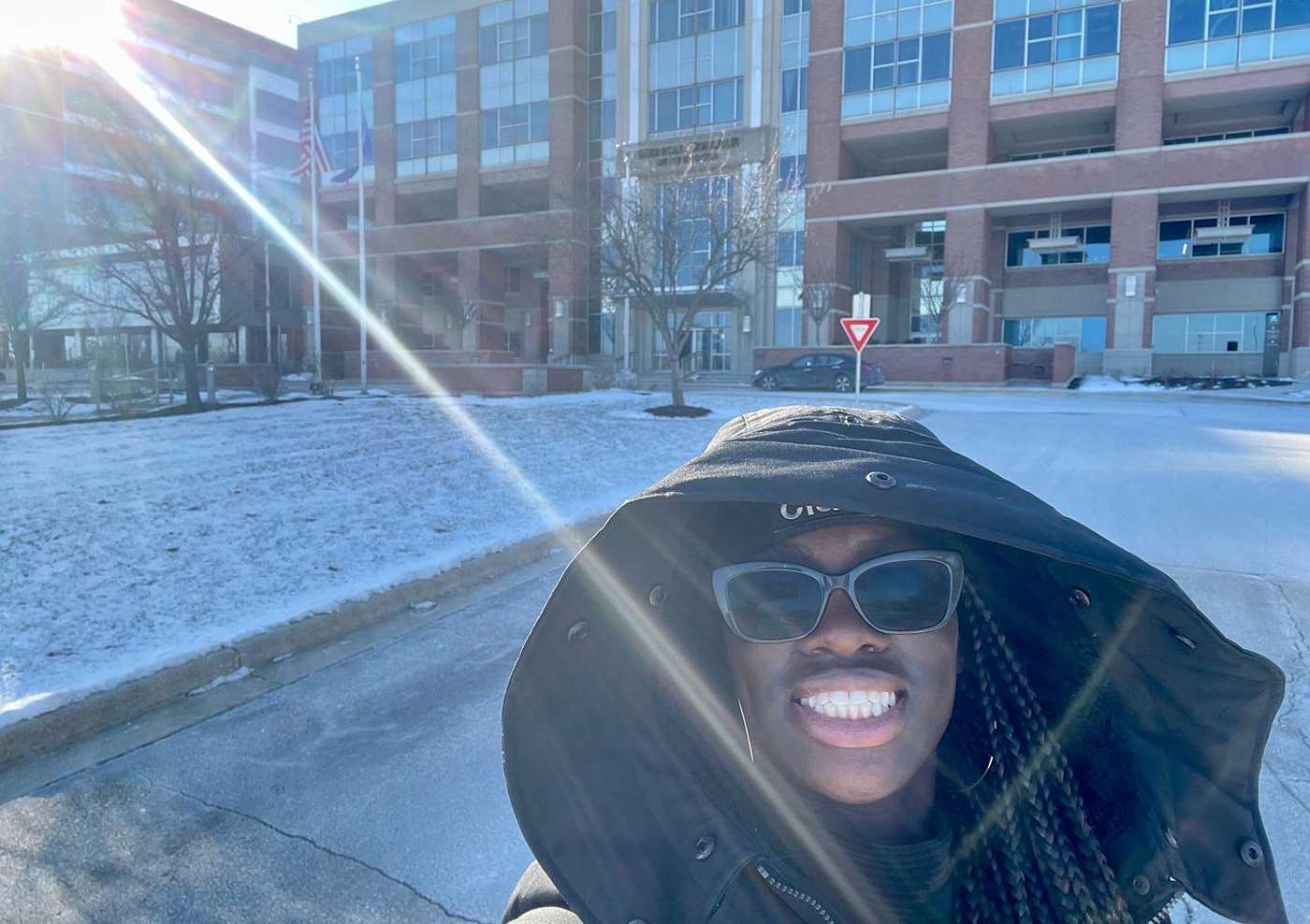 Oby Nwabuzor in front of Medical College of Wisconsin