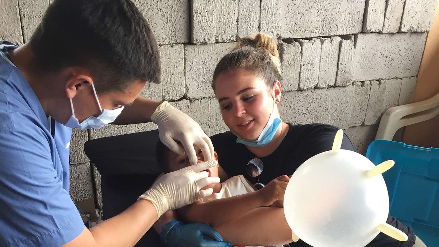 Medical professional giving vaccination