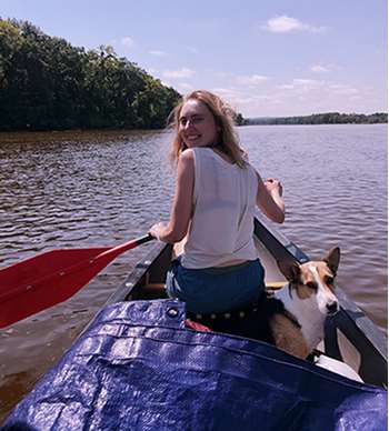 Kelsey Lamb, MCW medical student, in a boat