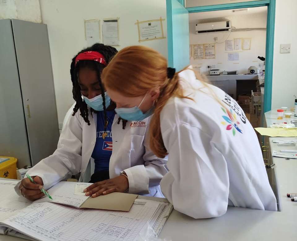 Two women reviewing information in a clinic setting