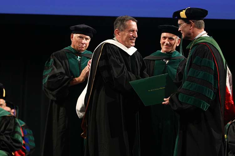 Michael Orban receiving honorary degree at 2018 MCW Commencement