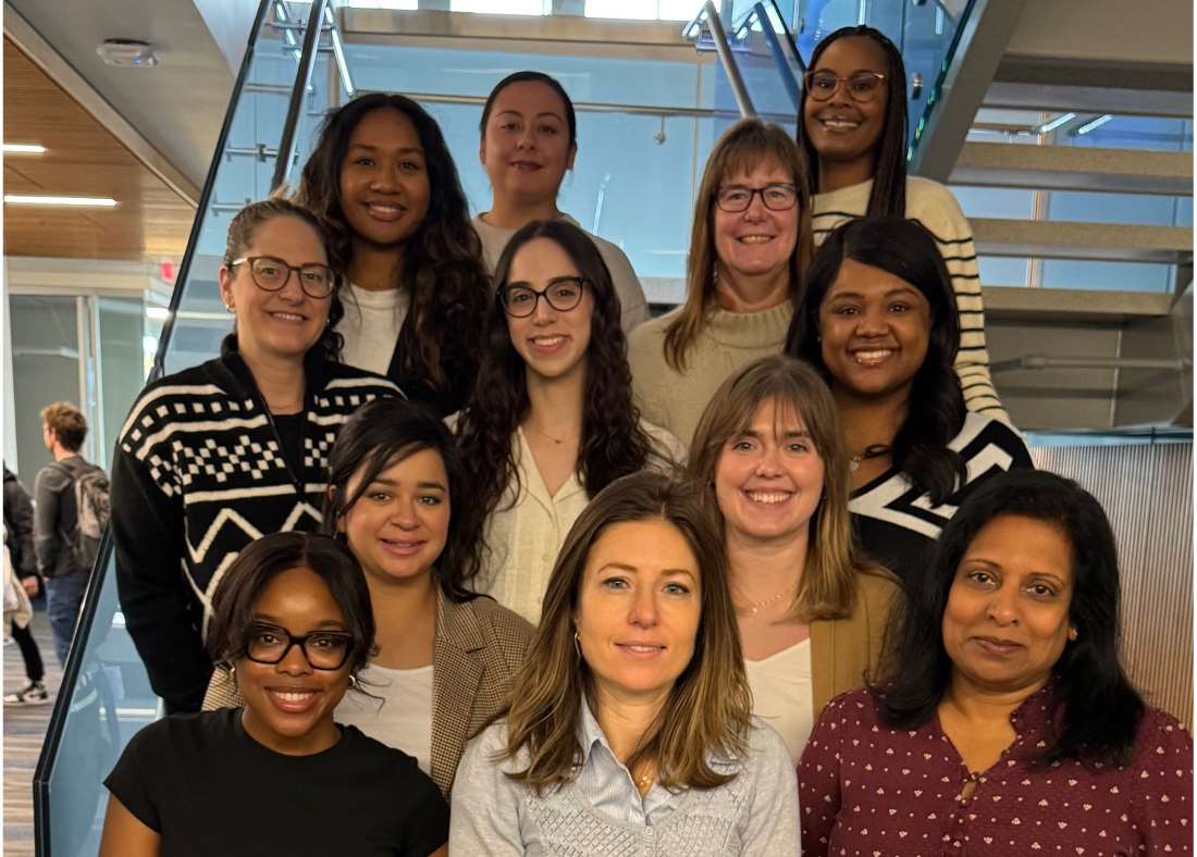 Dr. Anna Palatnik, MD, GME '13, (first row, center) with members of her lab