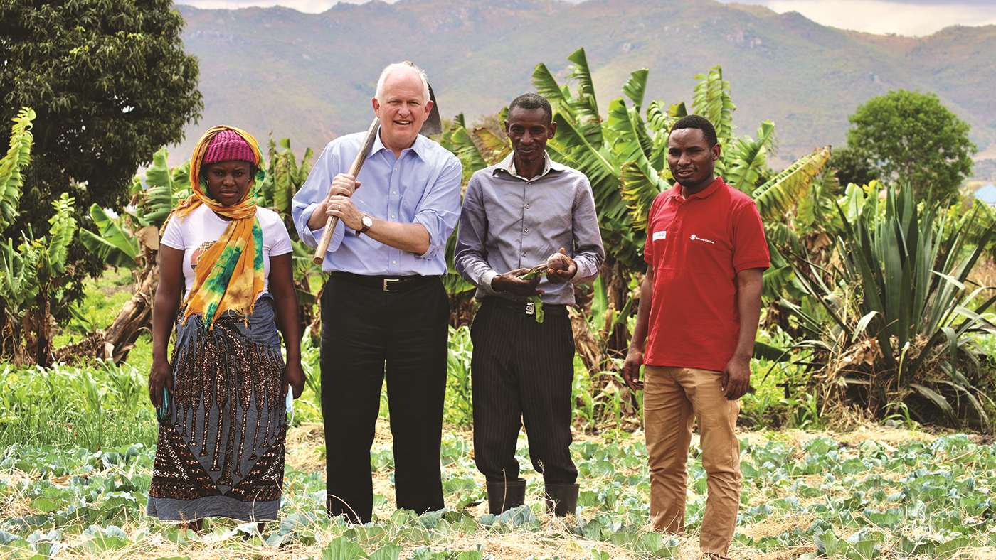 Dr. Donald J. Wright visits a USAID agriculture project in Tanzania that improves agricultural productivity