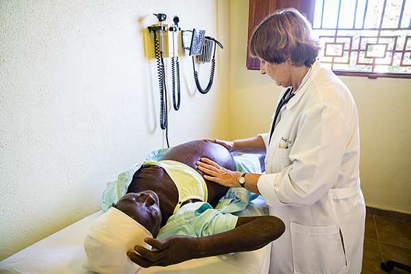 Dr. Wolf providing pregnancy care in rural Haiti