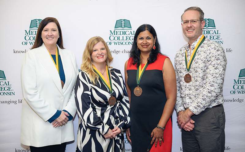 2024 Investiture Ceremony recipients (l-r): Drs. Timmons, Kohlbeck, Sahoo, Miller