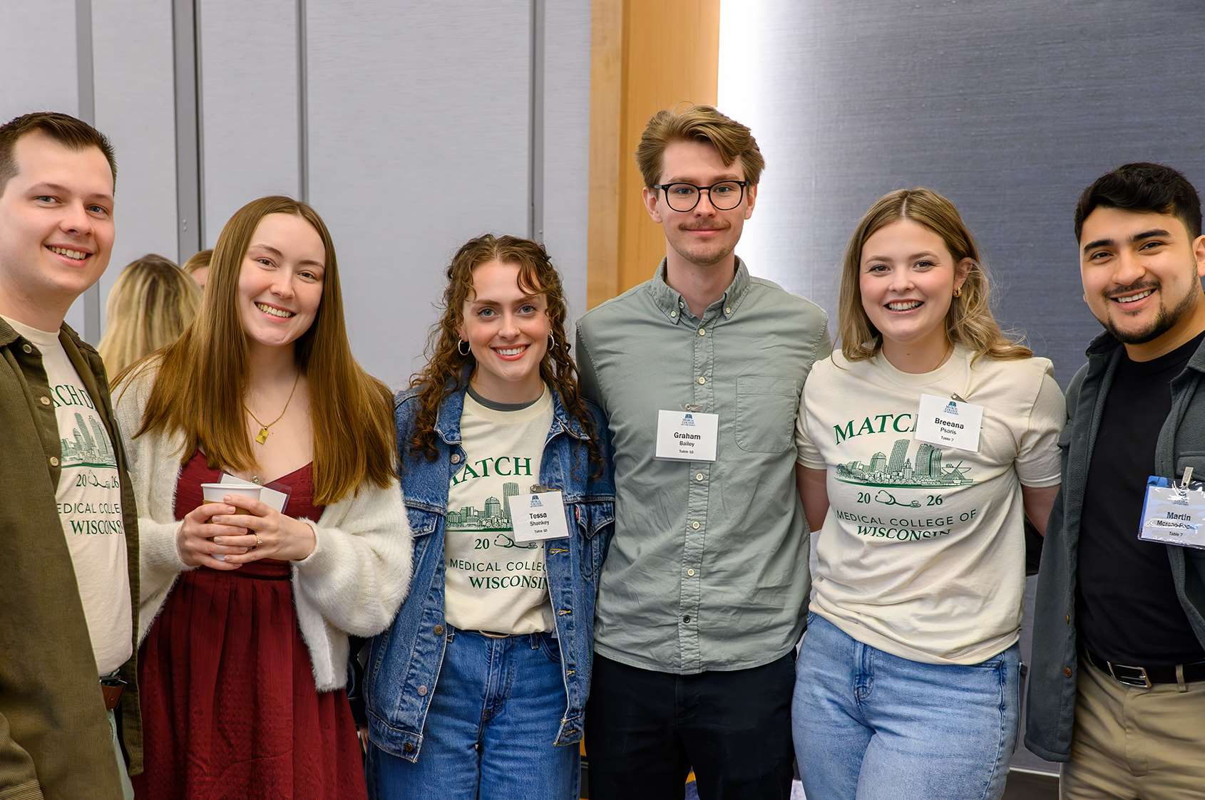 Graham Bailey (left), Tessa Shankey, and Breeana Psaris with their guests