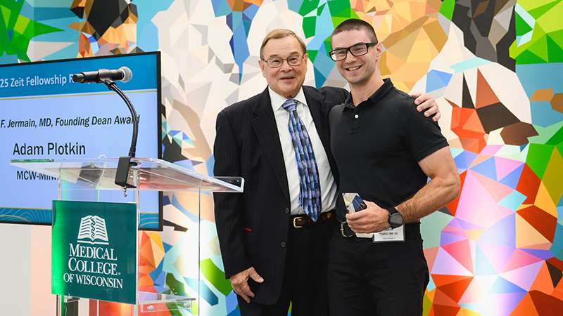 A man receiving an award at an event