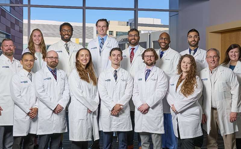 Neurosurgery residents in white coats