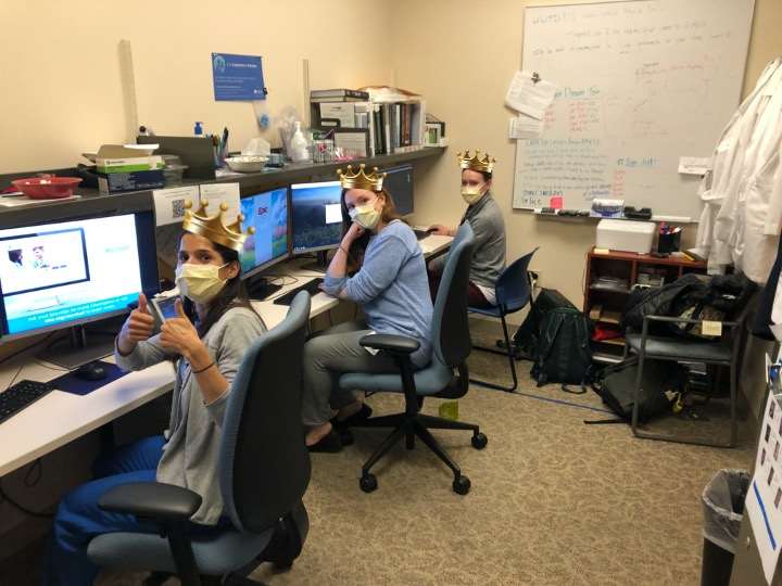 fellows in room with computers