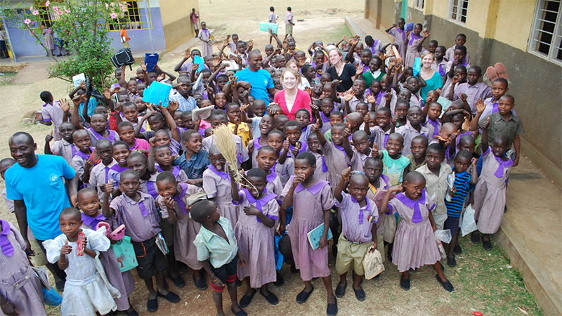 Dr. Johnson in Uganda with children