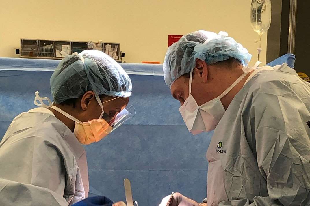 Drs. Munie (former fellow) and Kastenmeier performing an open components separation