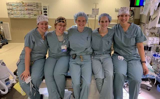 surgery residents sitting in hospital