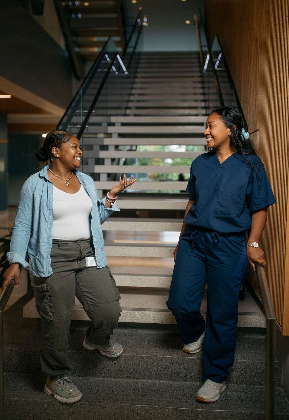 Two women on a staircase