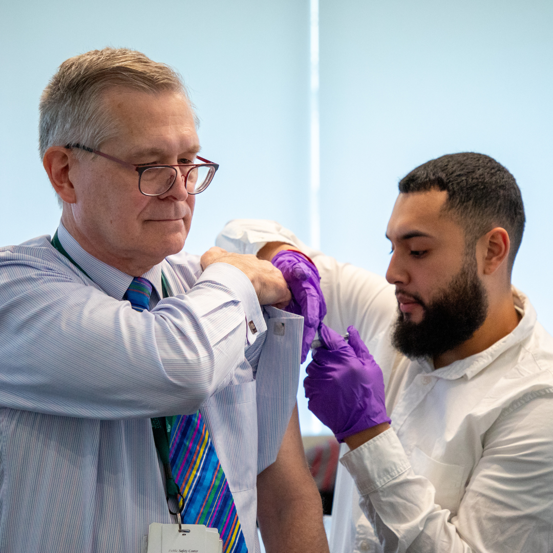Innovate Pharmacy student administers an immunization.