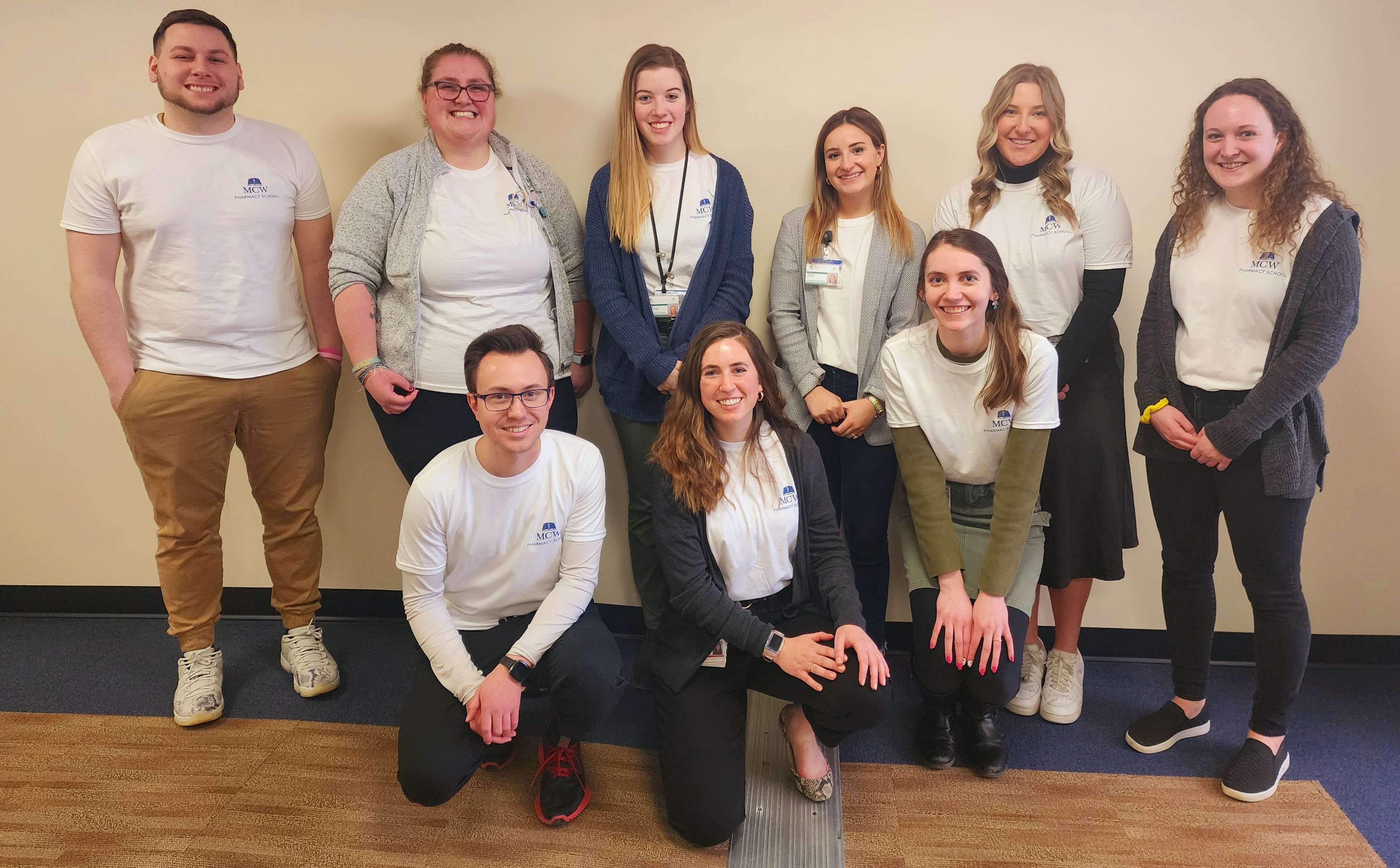 Group photo of Pharmacy School Student Ambassadors wearing matching MCW t-shirts.