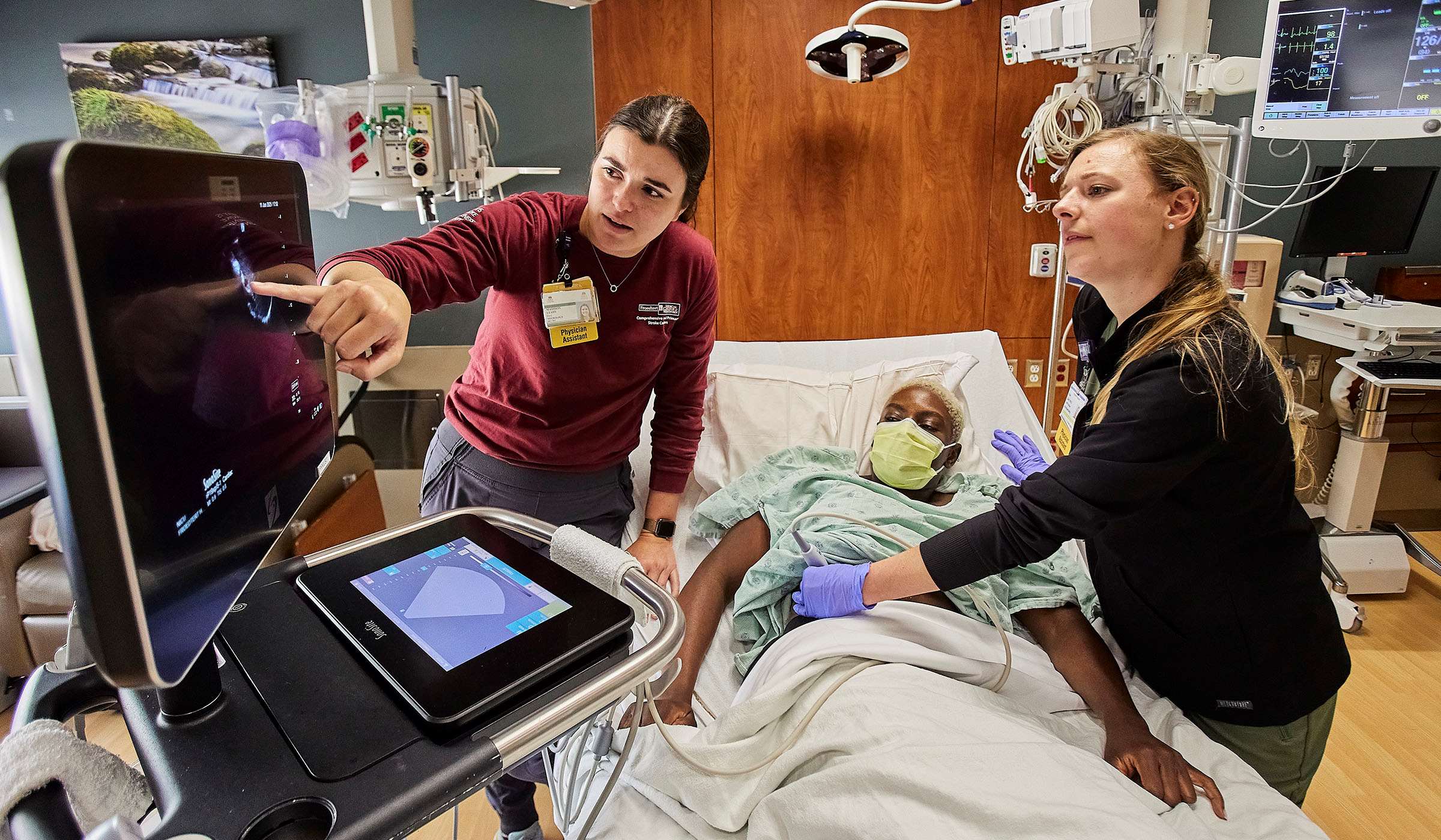 nurses performing an ultrasound on patient