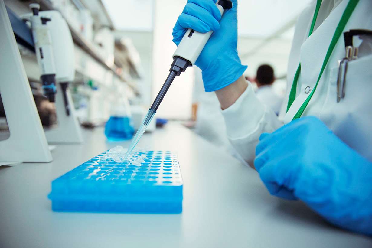 Hands research lab sample extraction
