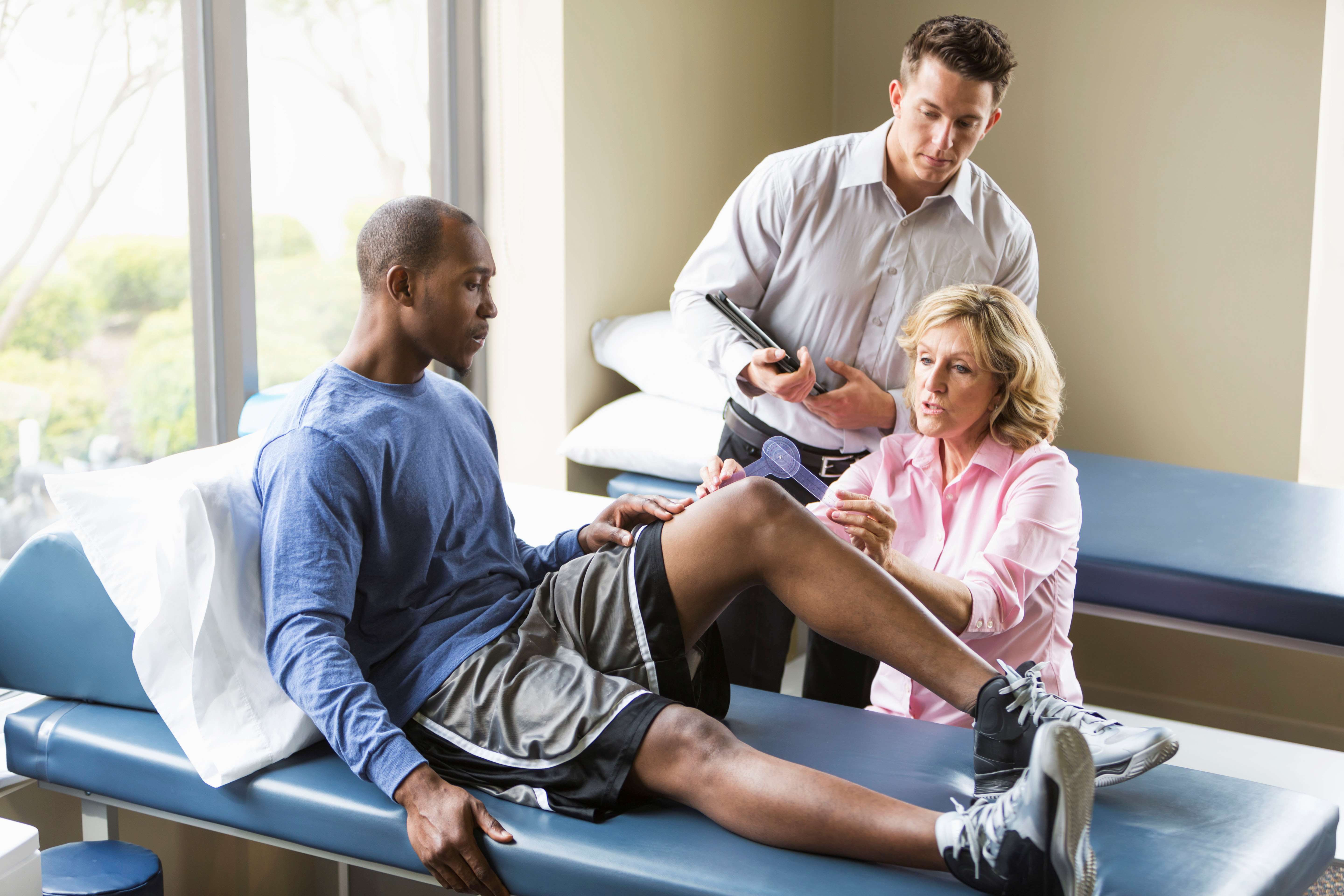 Physical Therapists F M Patient M Exam Table