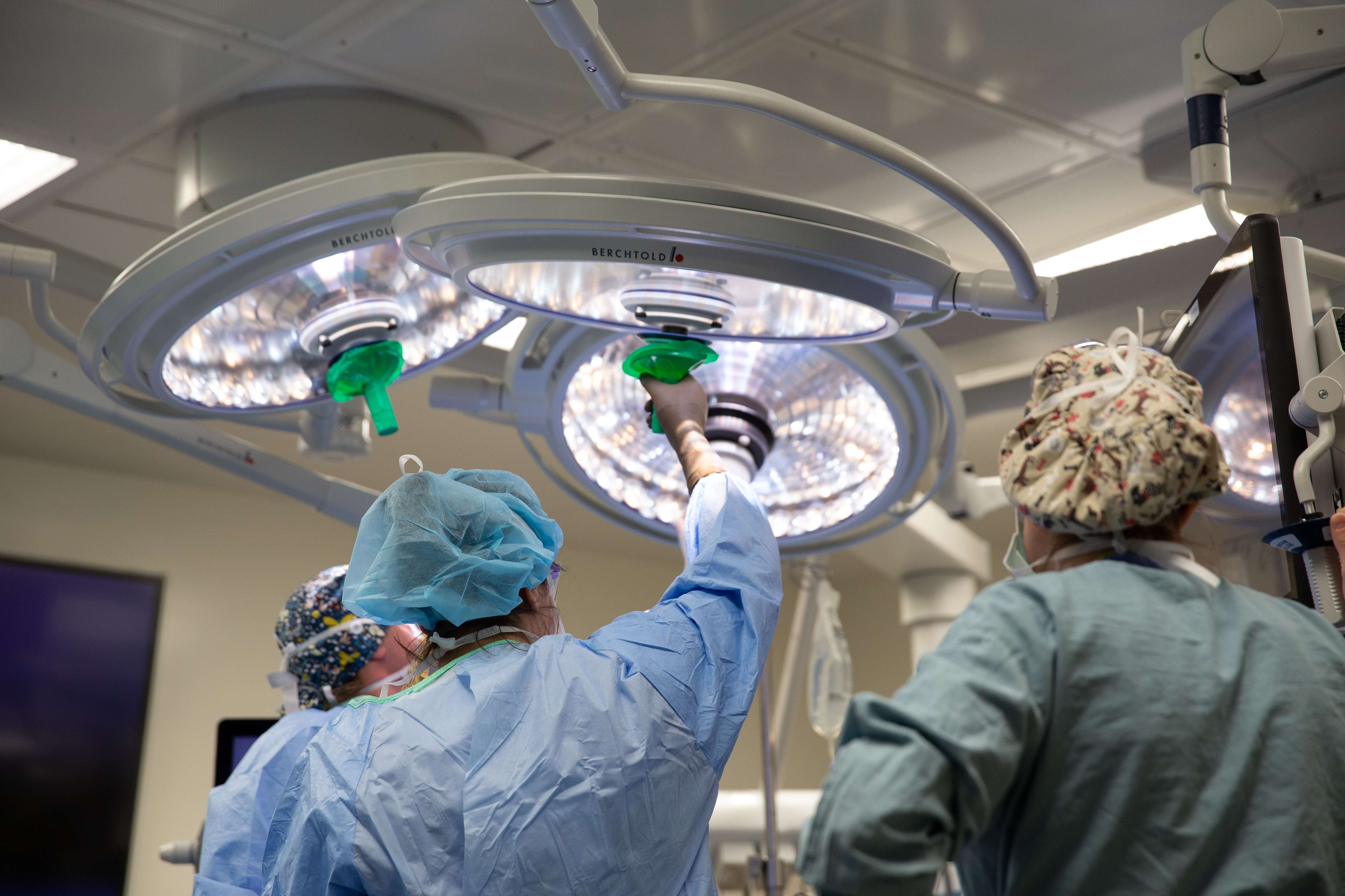 surgery operating room lights and medical providers
