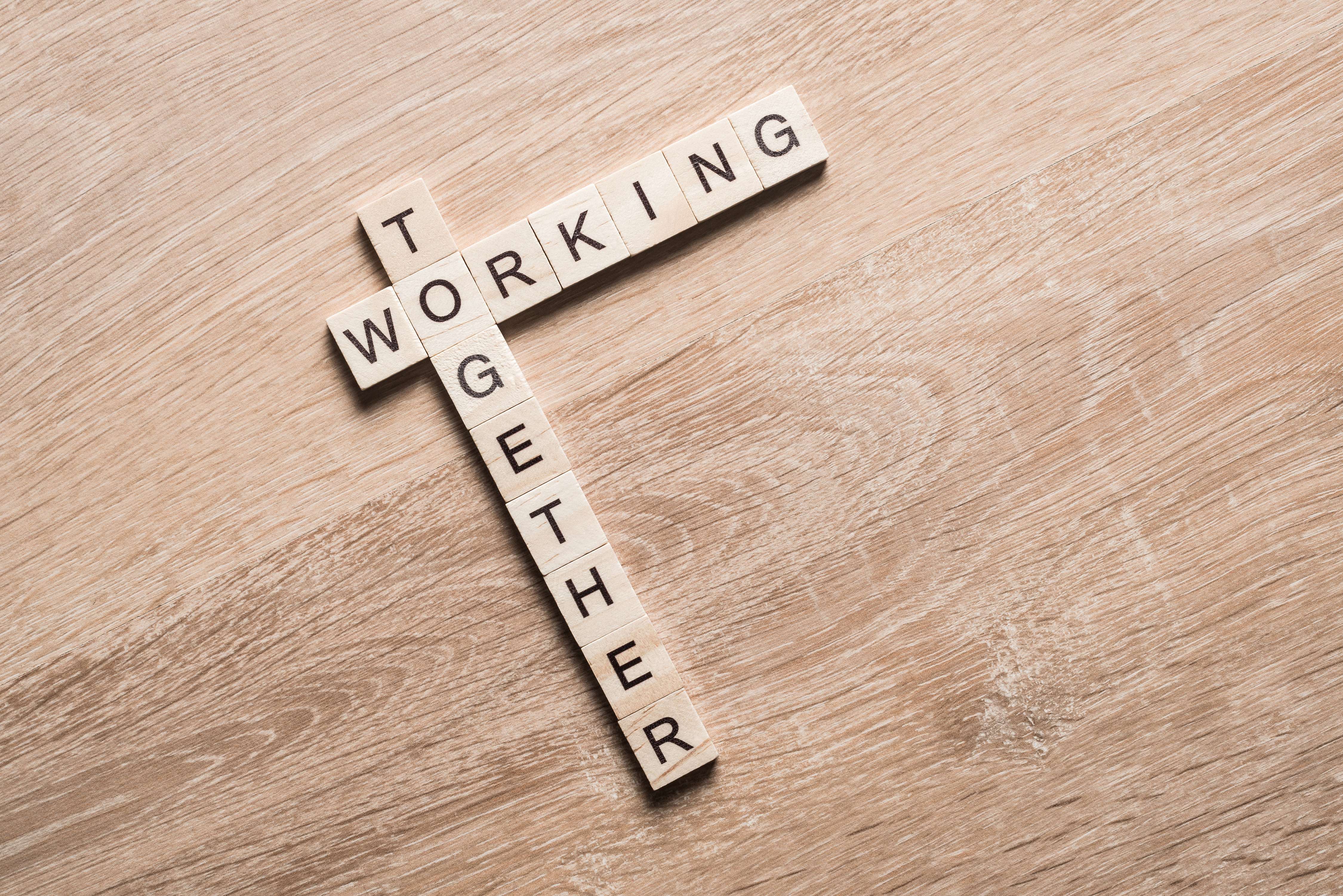 WorkingTogetherScrabbles_AdobeStock_150615584