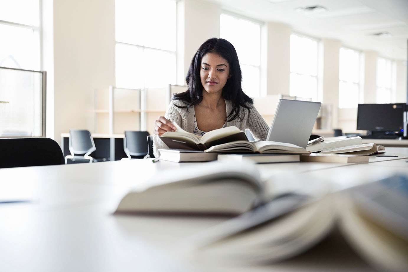 Female research with books